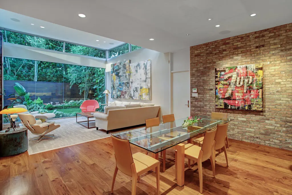 In this open plan, the breakfast area opens to the family room. (Photo by TK Images)