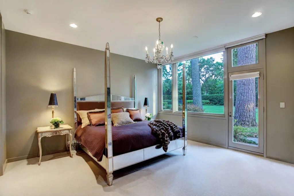 One of five bedrooms in the Hugo Victor Neuhaus Jr. house in River Oaks. (Photo by TK Images)