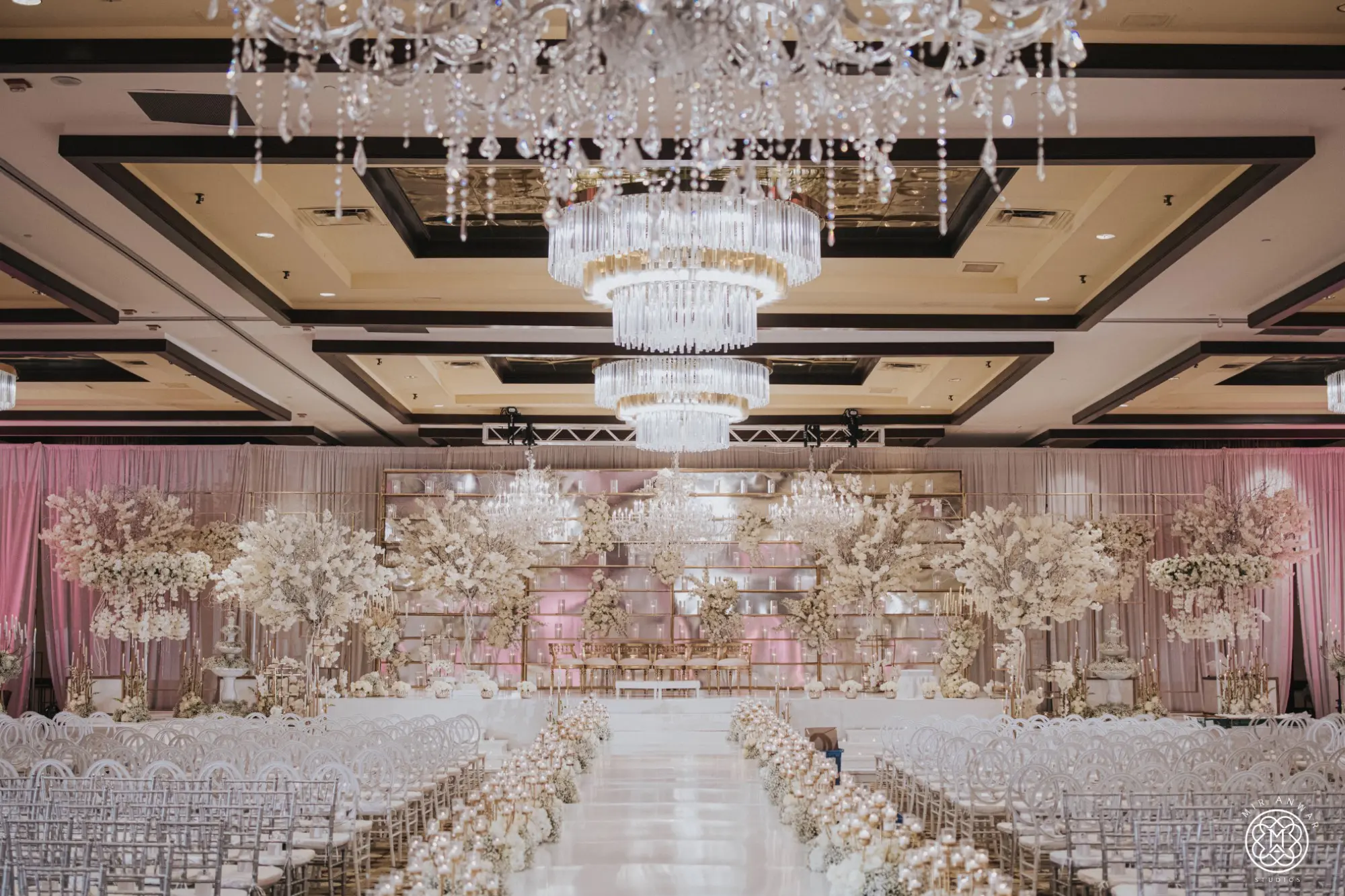 Lots of lights and large chandeliers made the ceremonies elegant and beautiful. (Photo by Mir Anwar Studios)
