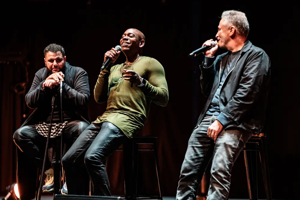 Mo Amer, Dave Chappelle, Jon Stewart on stage at Royal Albert Hall, one of Amer's most memorable shows. (Matthieu Bitton photo)