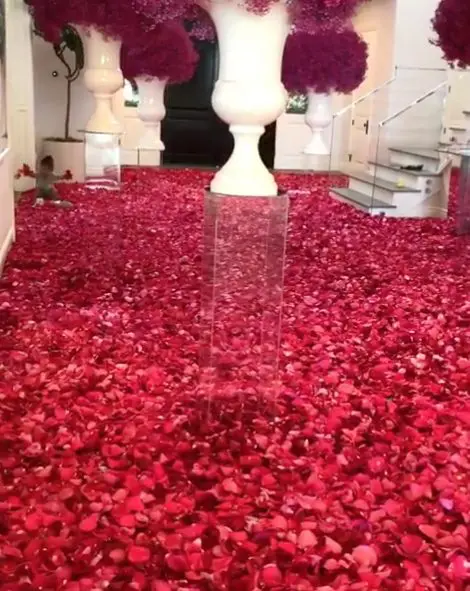 In 2019 Travis Scott filled the foyer of the home he shared with Kylie Jenner with thousands of rose petals in advance of her birthday. Instagram photo