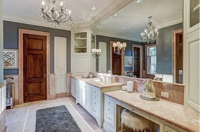 Architect Ed Eubanks designed the European style villa in Memorial where the master bath is more traditional.