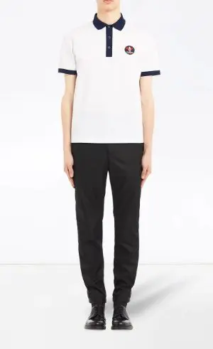 Prada pique polo, available at Farfetch.com, $550.