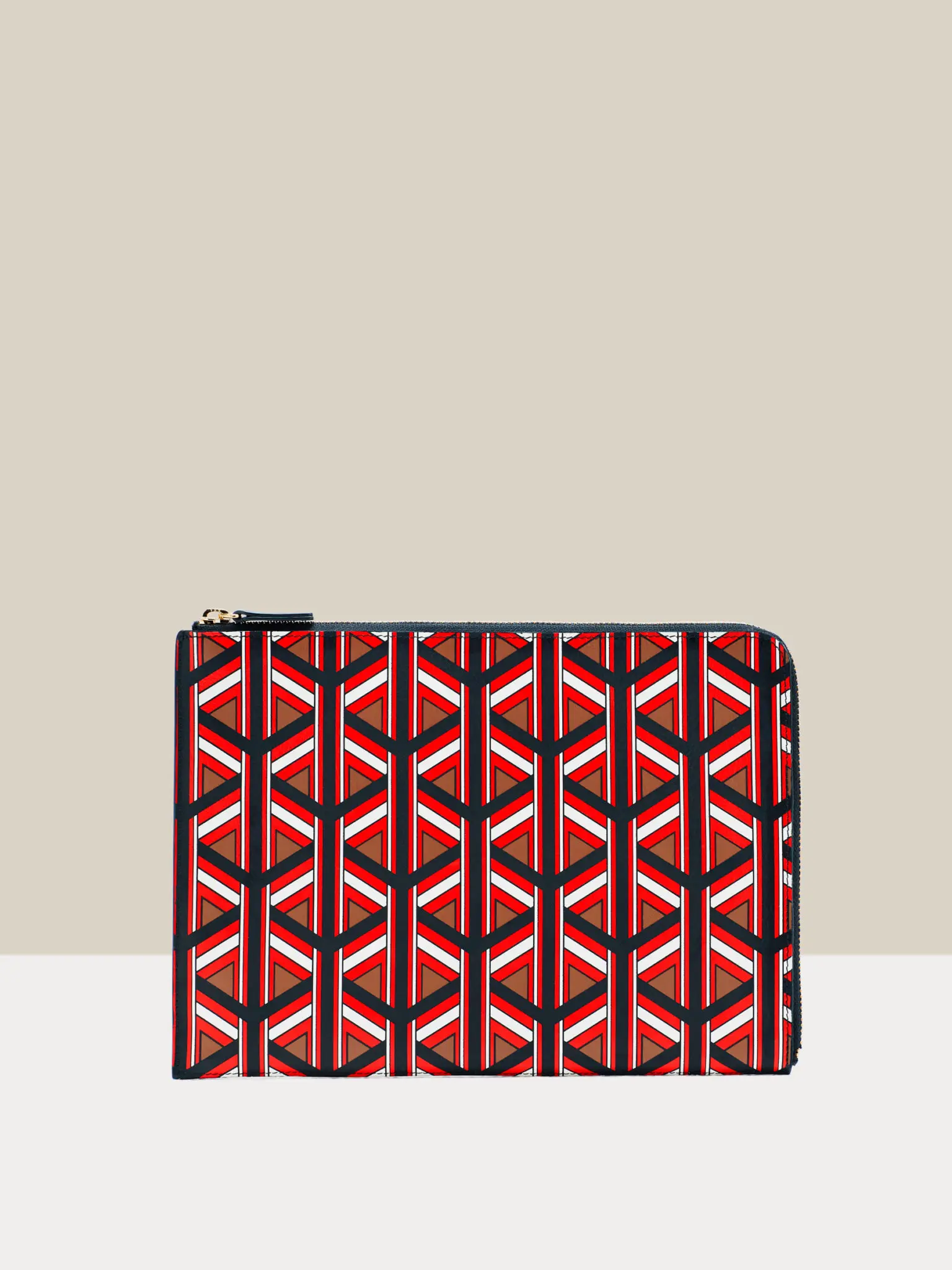 It includes Geotile designs on wallets, pouches, and more.