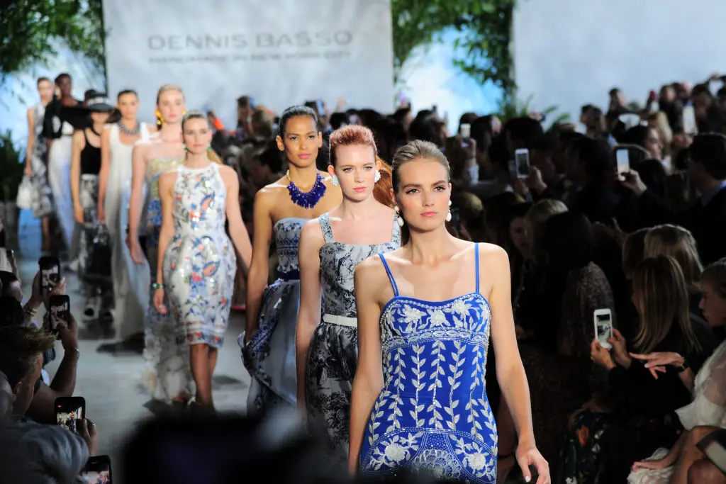 The Dennis Basso spring 2020 collection includes sporty day wear, cocktail and eveningwear in a color palette of china blue and white, café crème, and classic black and white. (Photo by Owen Hoffmann/Patrick McMullan via Getty Images)