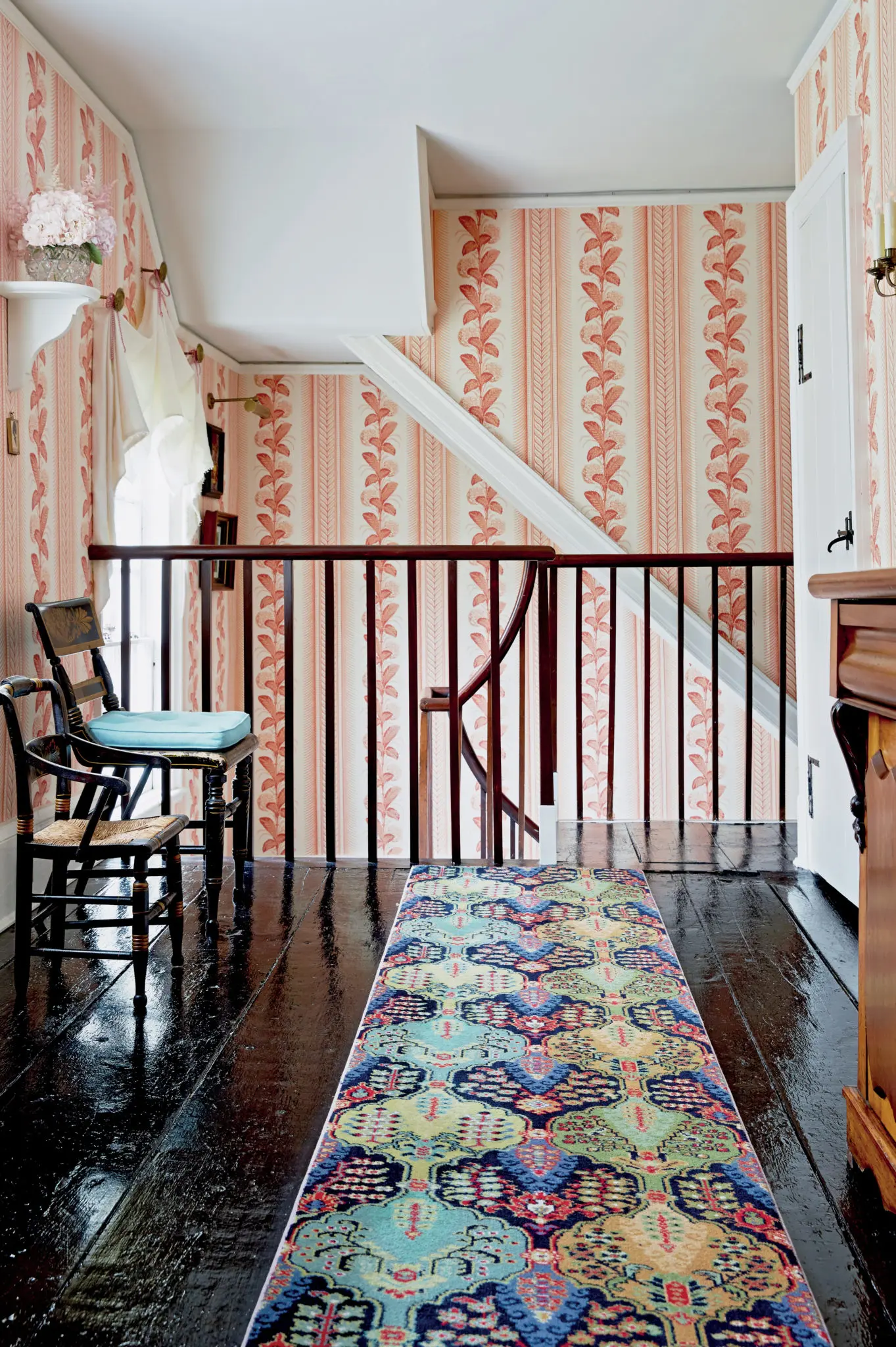 The black painted floors anchor the room and provide a perfect foil for pattern.