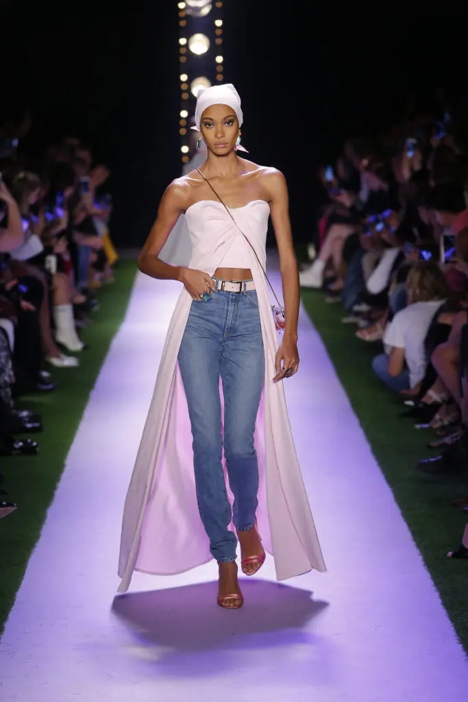 Brandon Maxwell denim jeans, strapless top with flowing train. (Photo courtesy of Brandon Maxwell)