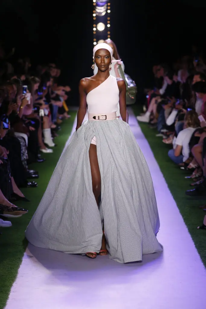 Brandon Maxwell seersucker ball skirt over  one-shoulder pink maillot. (Photo by Brandon Maxwell)