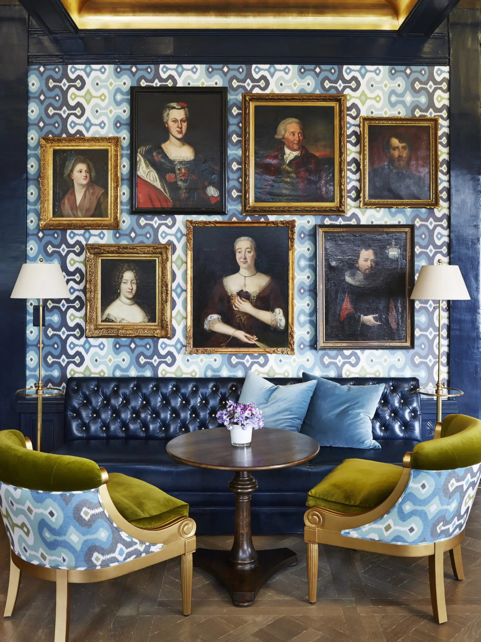 In a detail of the Gutsch Bar, or Ancestor Bar, as Bullard calls it, local gentry are hung together over a cocktail table setting. The portraits date from the mid-sixteenth century through the late nineteenth century. 