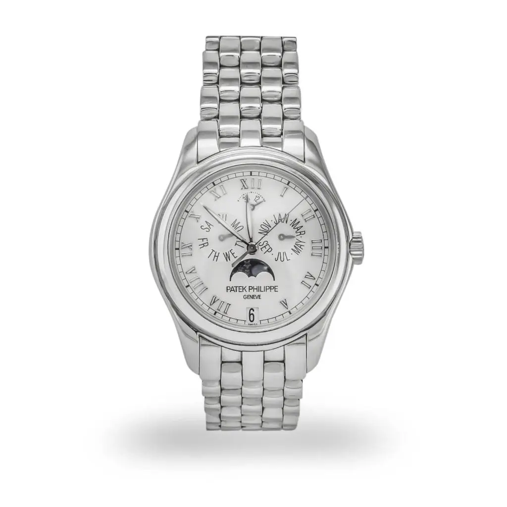Patek Philippe Annual Calendar 5036 White Gold with 18K white gold link bracelet, exhibition back, and silver opaline dial with Roman numerals.