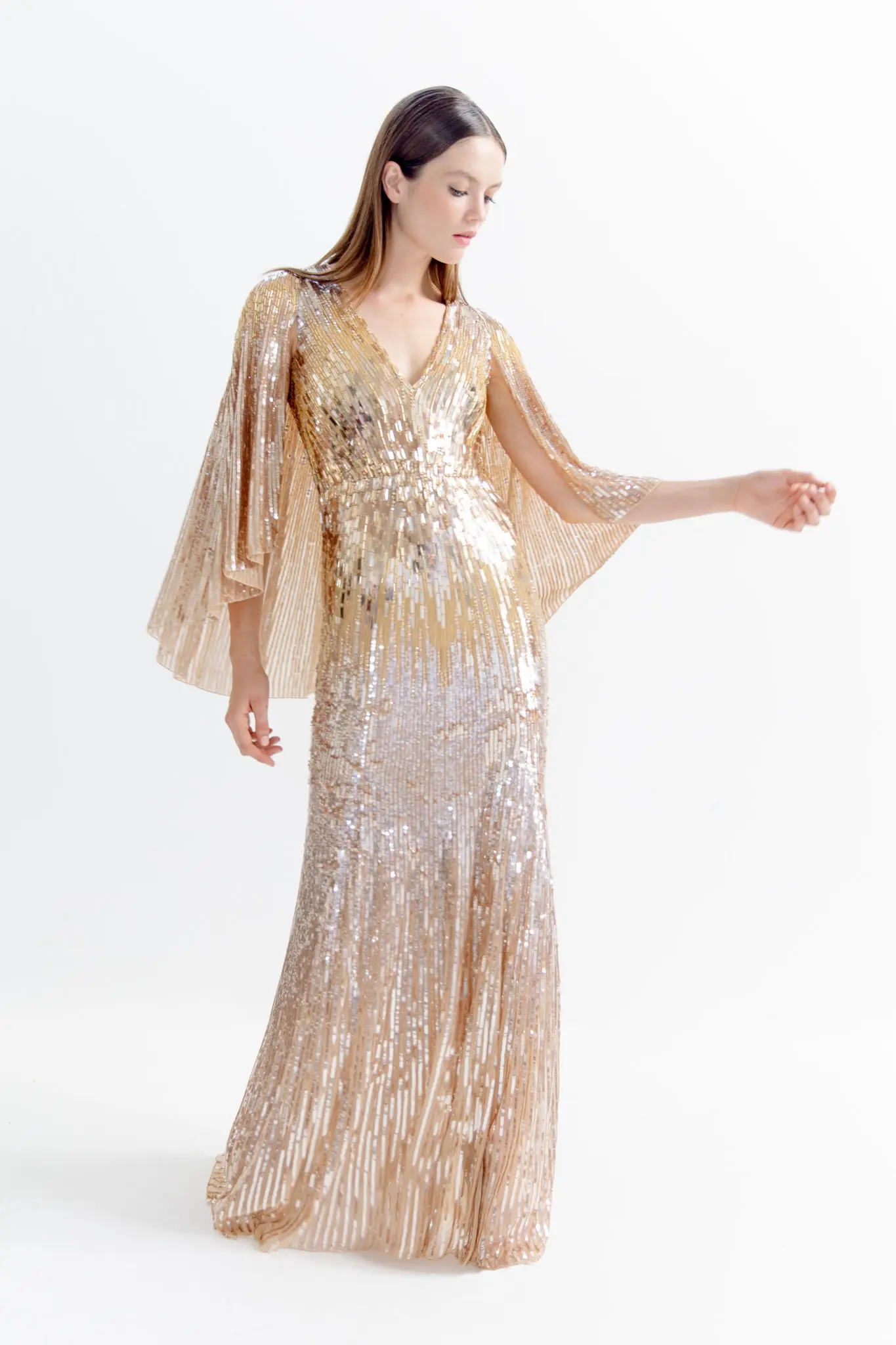 Jenny Packham gold sequin embellished caped gown. (Photo courtesy of Jenny Packham)