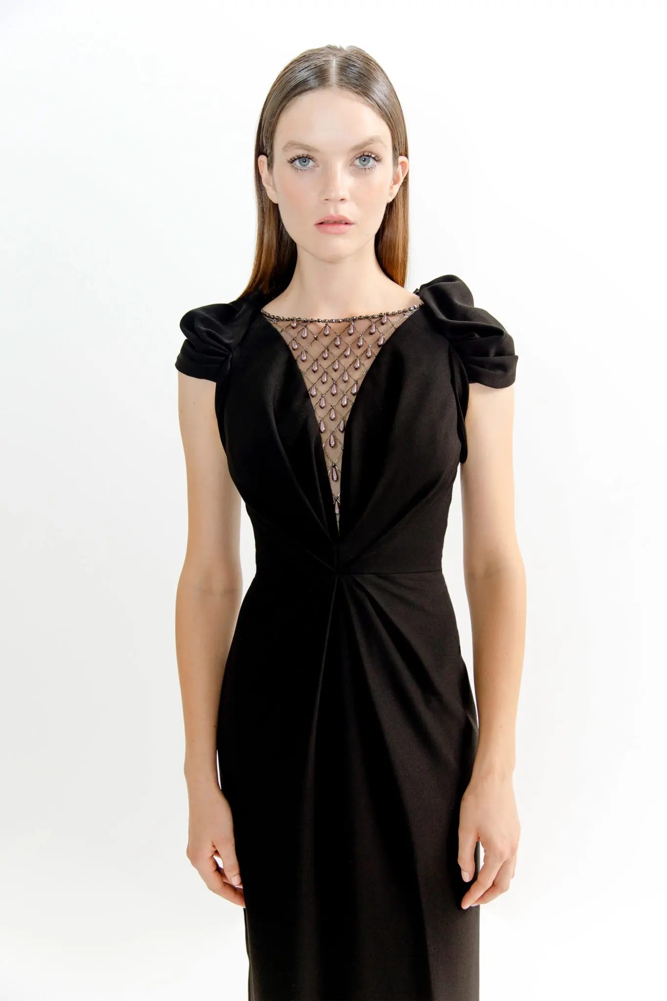 Jenny Packham black crepe cocktail dress with crystal and pearl embellished lattice tulle neckline. (Photo courtesy of Jenny Packham)