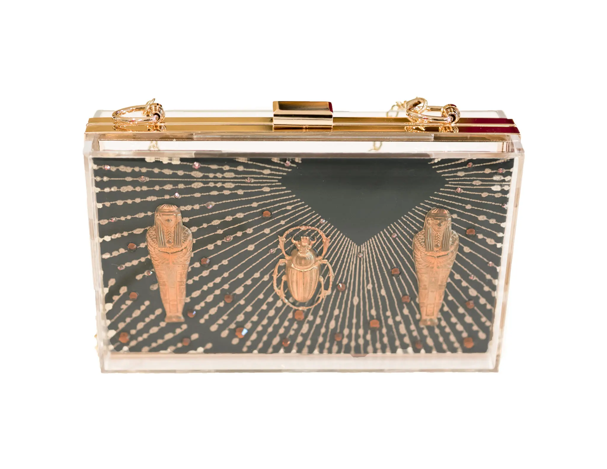 Scarabs represent good luck and sarcophagi represent divine protection, so Peck adorned the Aida bag with both.