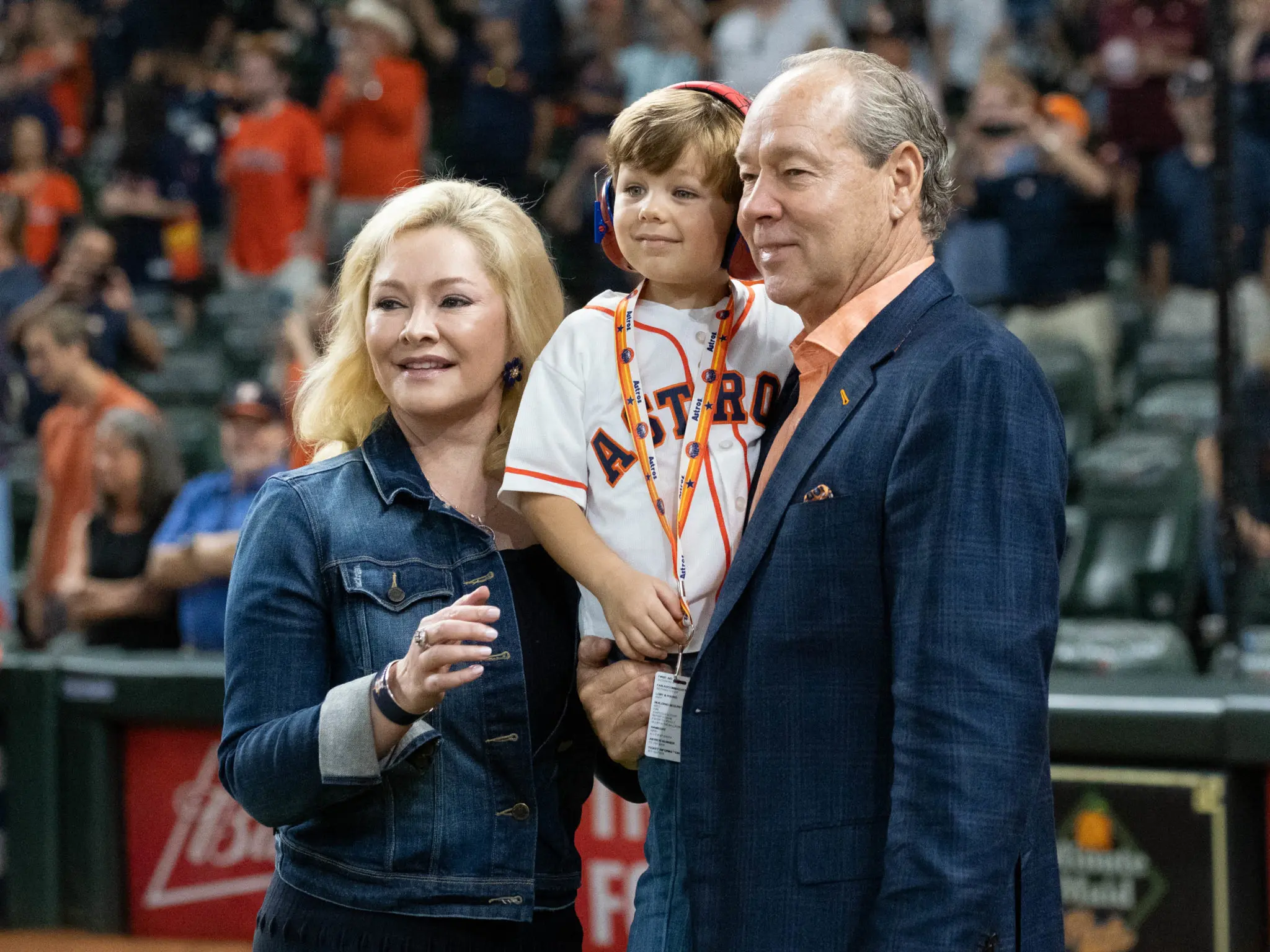 Whitney and Jim Crane made sure their young son experienced the Astros' celebrating ways. (Photo by F. Carter Smith)