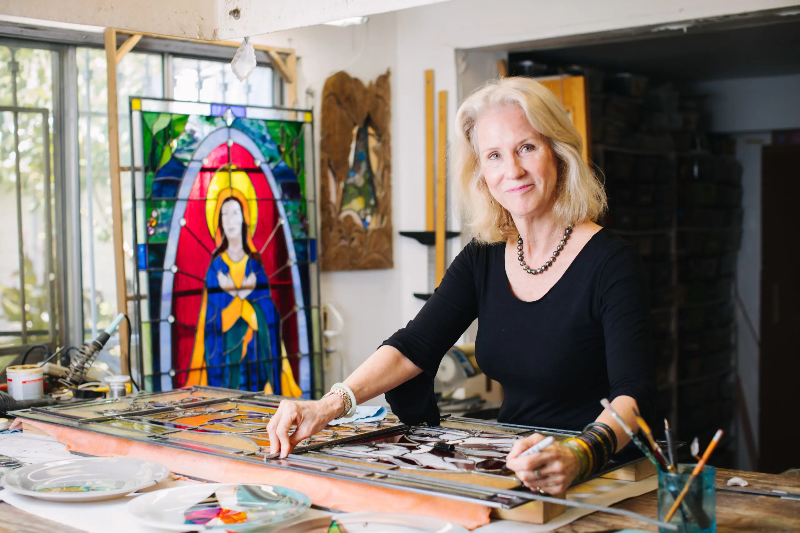 Glass artist Kim Clark Renteria in her House of Luminosity, (Photo by www.ThaninPhoto.com)