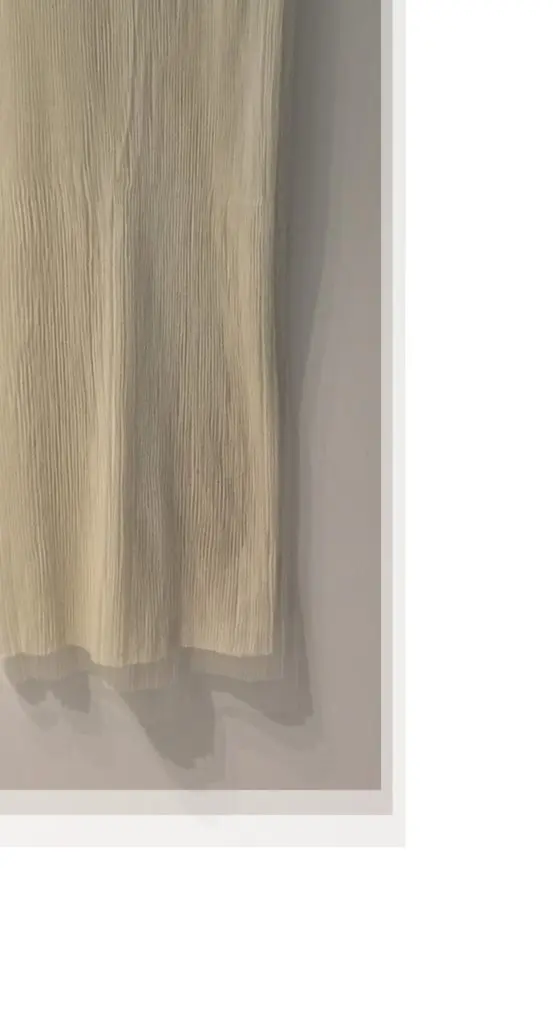 "This season we played with string and straps, inspired by a spy’s mapping of crime on a board and we also explored parachute construction. As spies use parachutes to disappear from the scene, I pictured a very romantic and delicate parachute dress that the spy might wear, where as they walk the dress increases in volume like a parachute. The wrapping and draping techniques throughout the collection represent how delicate and sensitive spies are, and how lonely they feel once they feel safe from the outside world." — Moon Choi


