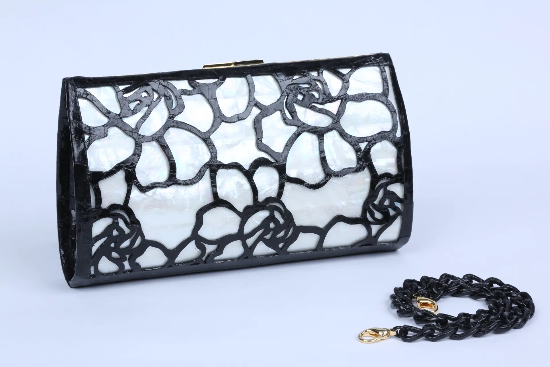 Nancy Gonzalez Collect crocodile clutch  with flower cutout over mother of pearl. (Photo courtesy of Nancy Gonzalez)