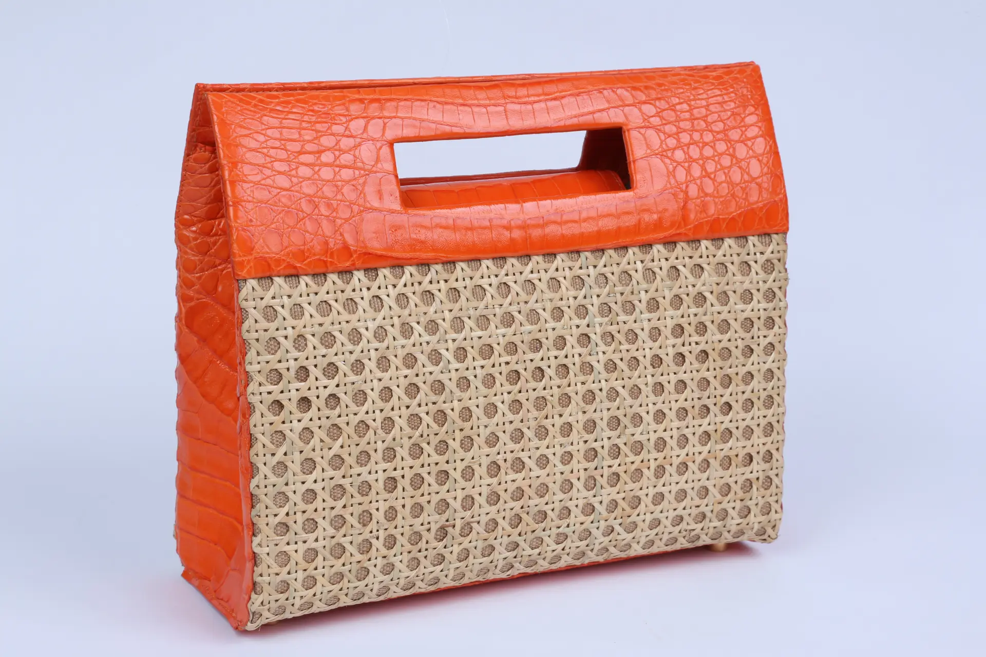 Nancy Gonzalez crocodile and linen tote with cane key hole detail. (Photo courtesy of Nancy Gonzalez)