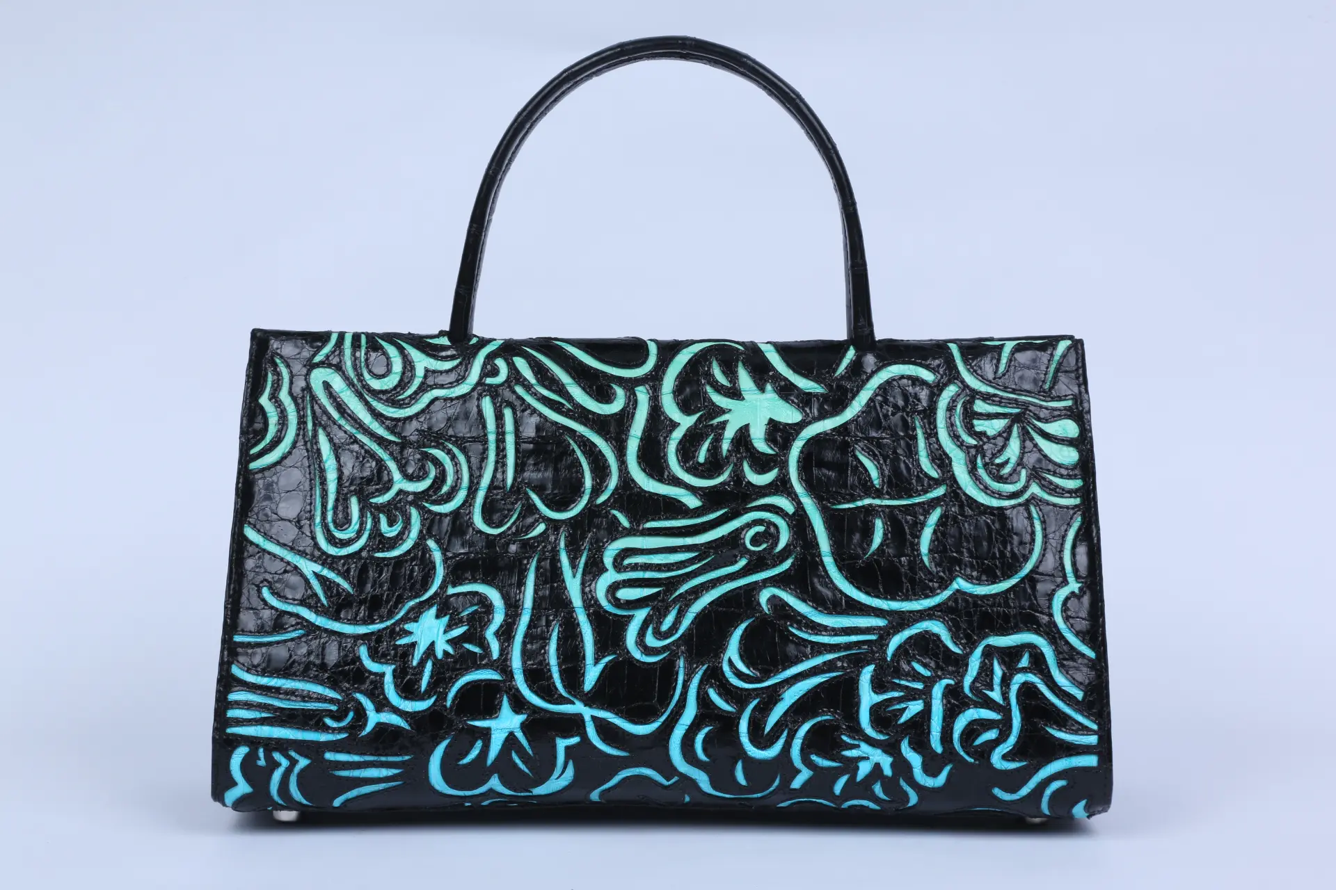 Nancy Gonzalez Wallis laser cut top handle handbag. (Photo courtesy of Nancy Gonzalez)