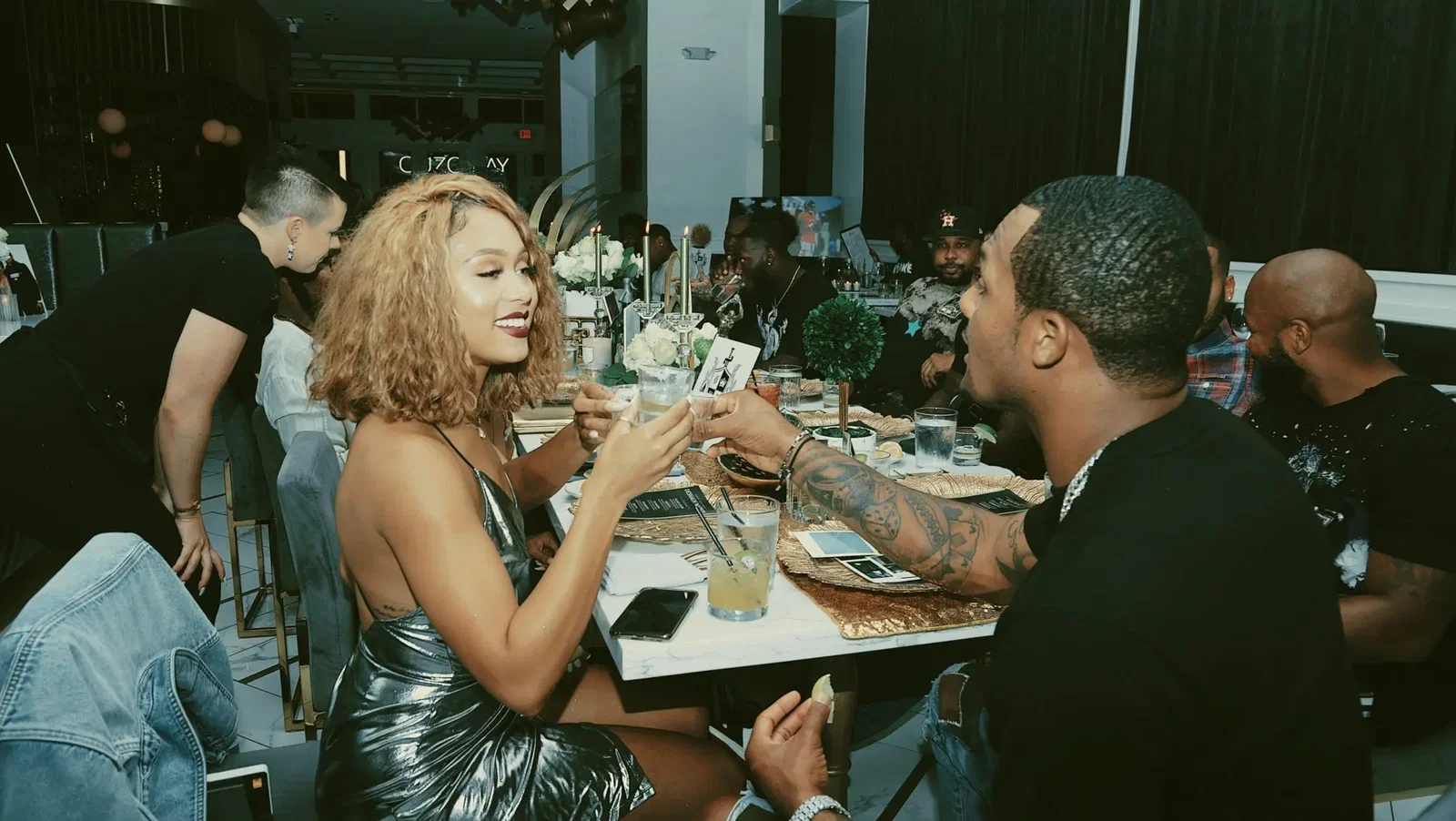 A special toast between Jilly Anais and DeShaun Watson.