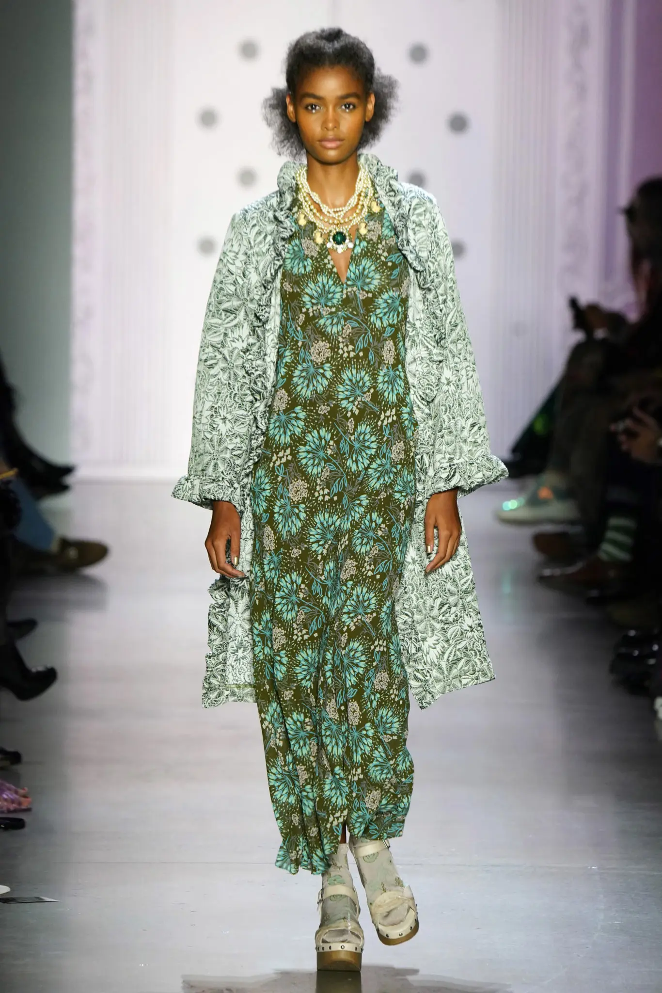 Anna Sui olive multi jungle gardenia jacquard coat and multi firework garden dress. (Photo by Thomas Lau courtesy of Anna Sui Design Studio)