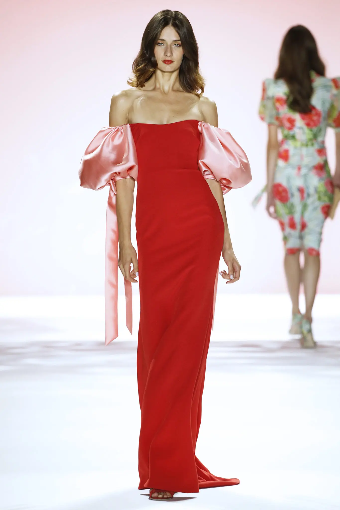 Badgley Mischka red evening gown with pink sleeves. (Photo courtesy of Badgley Mischka)