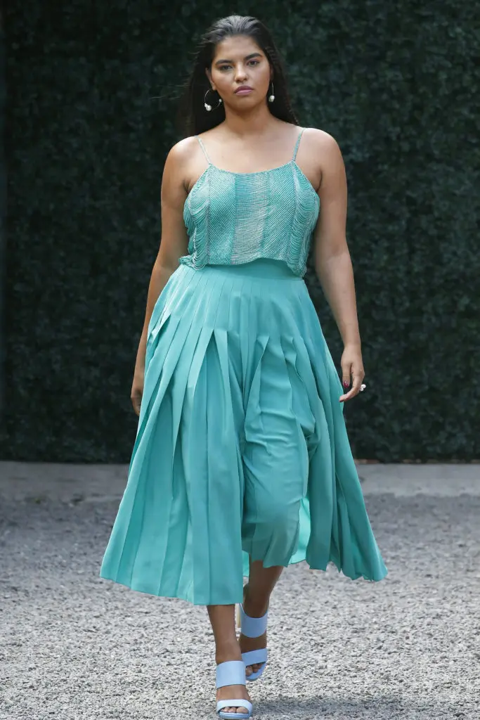 Burnett New York emerald beaded tank with pleated skirt. (Photo courtesy of Burnett New York)