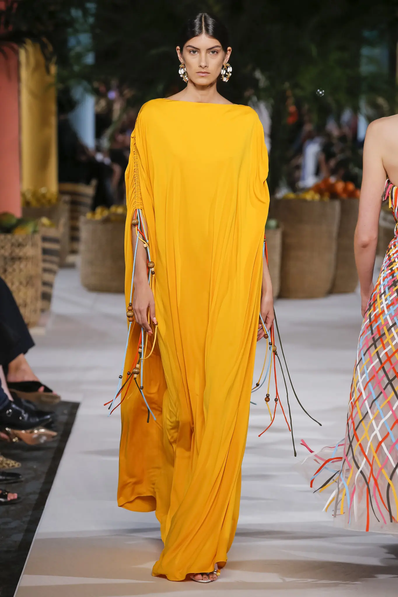 Oscar de la Renta marigold caftan with string detail. (Photo courtesy of Oscar de la Renta)