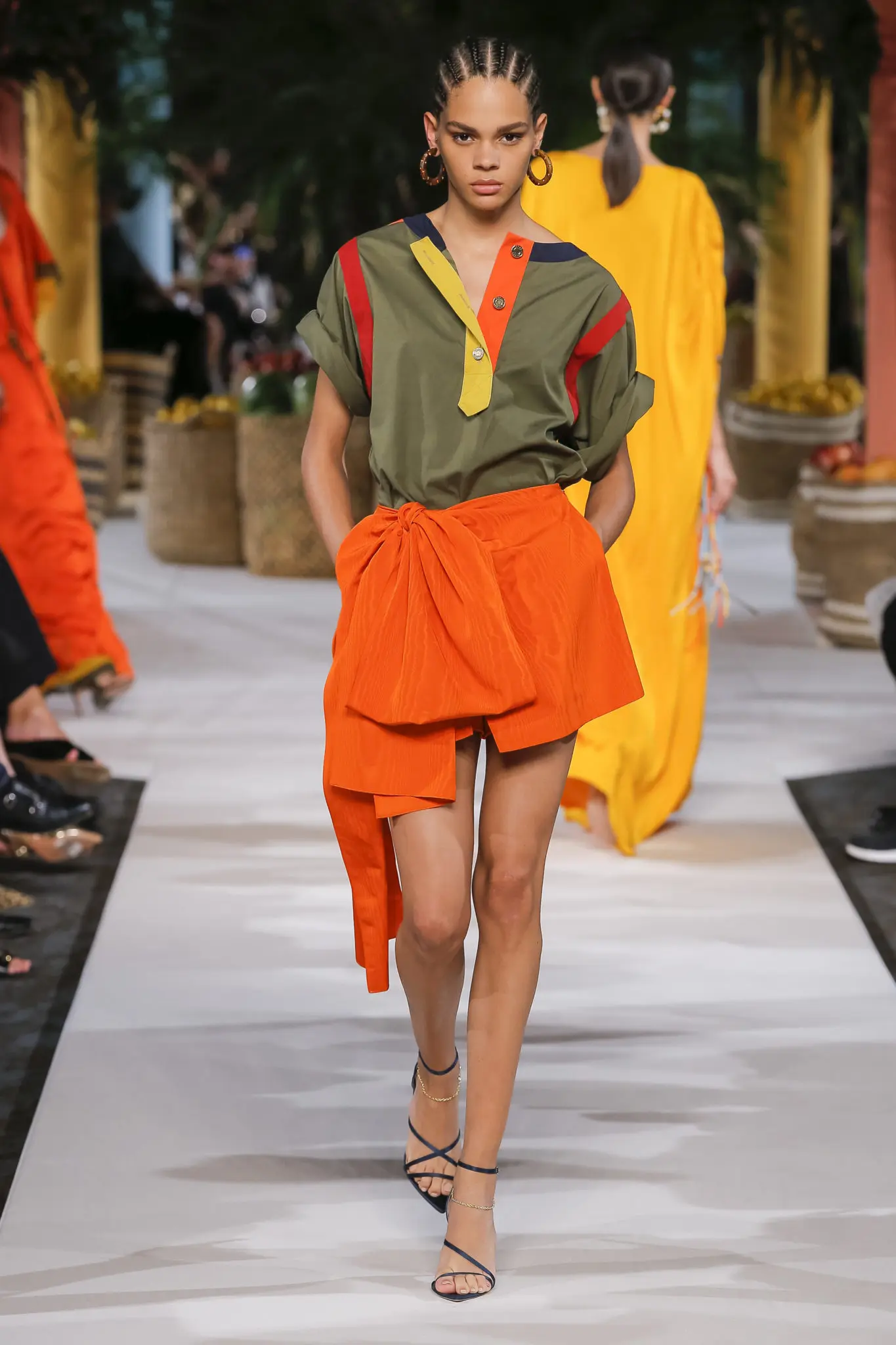 Oscar de la Renta orange shorts with bow detail and multicolored camp shirt. (Photo courtesy of Oscar de la Renta)