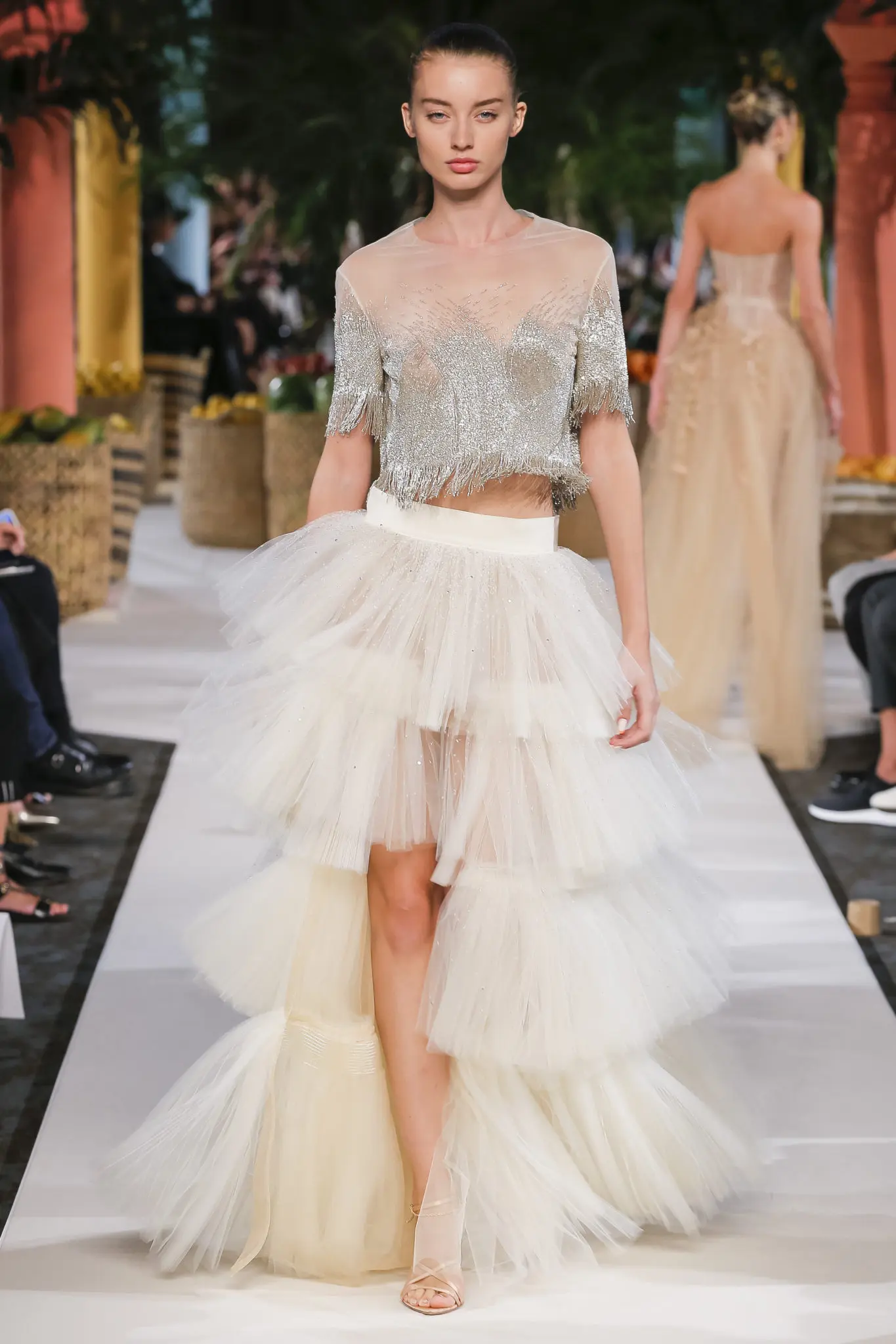 Oscar de la Renta cropped crystal-studded blouse and tiered tulle skirt. (Photo courtesy of Oscar de la Renta)