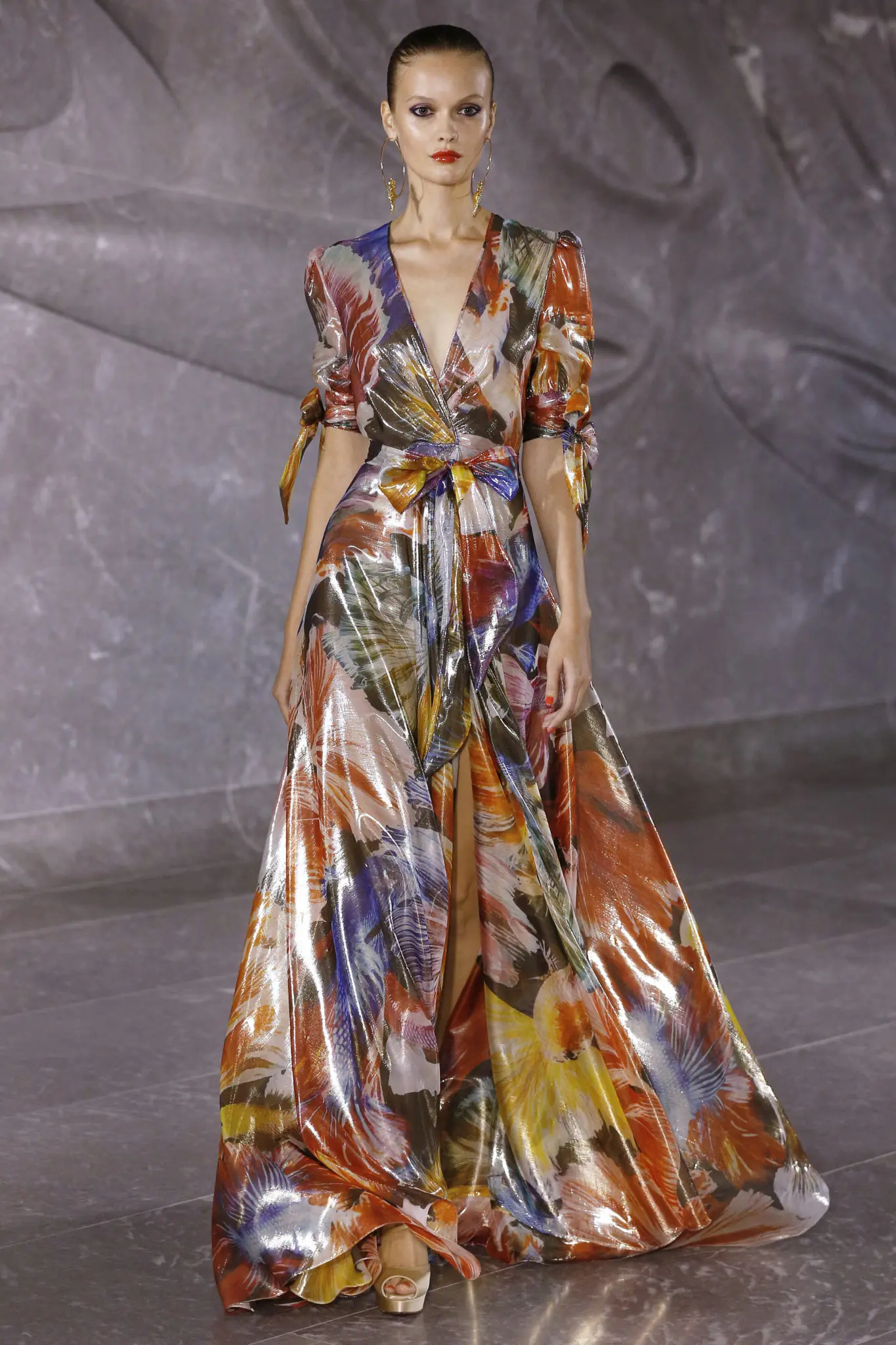 Naeem Khan V-neck abstract Japanese fighting fish lame gown with tied waist. (Photo by Dan Lecca)