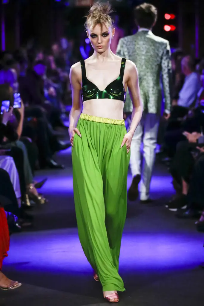 Tom Ford flowing neon green pants with elastic waist and black and green metallic bra. (Photo courtesy of Tom Ford)