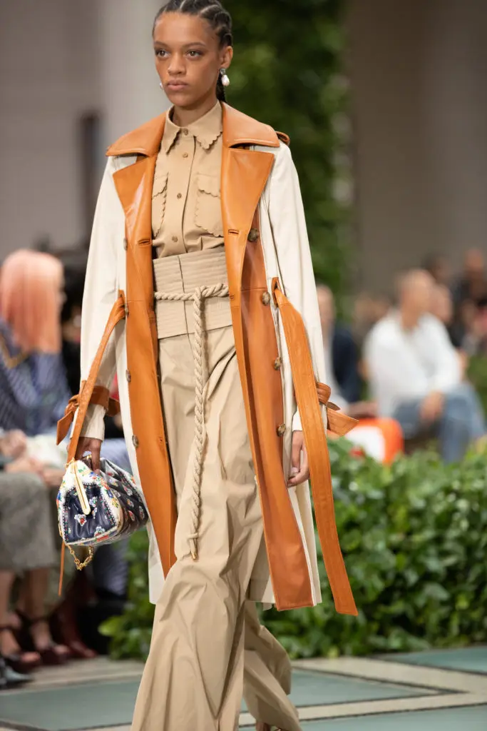 Tory Burch leather-paneled cotton trench coat, cotton twill shirt, and taffeta pant. (Photo courtesy of Tory Burch)