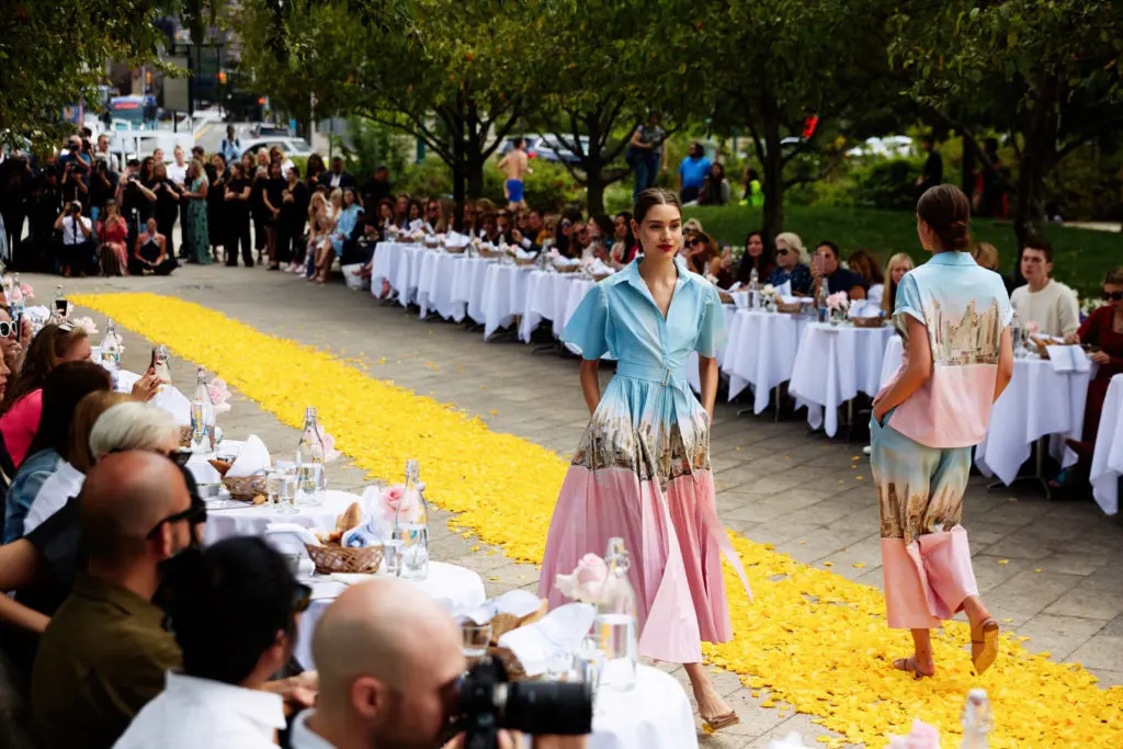 Models strolled the runway, which was strewn with yellow rose petals. (Photo by Taylor Jewell)