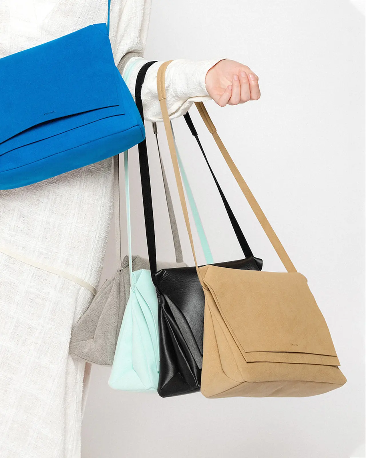 Owner and former fashion designer Nicole Kwon just launched her own collection of versatile vegan leather bags. 