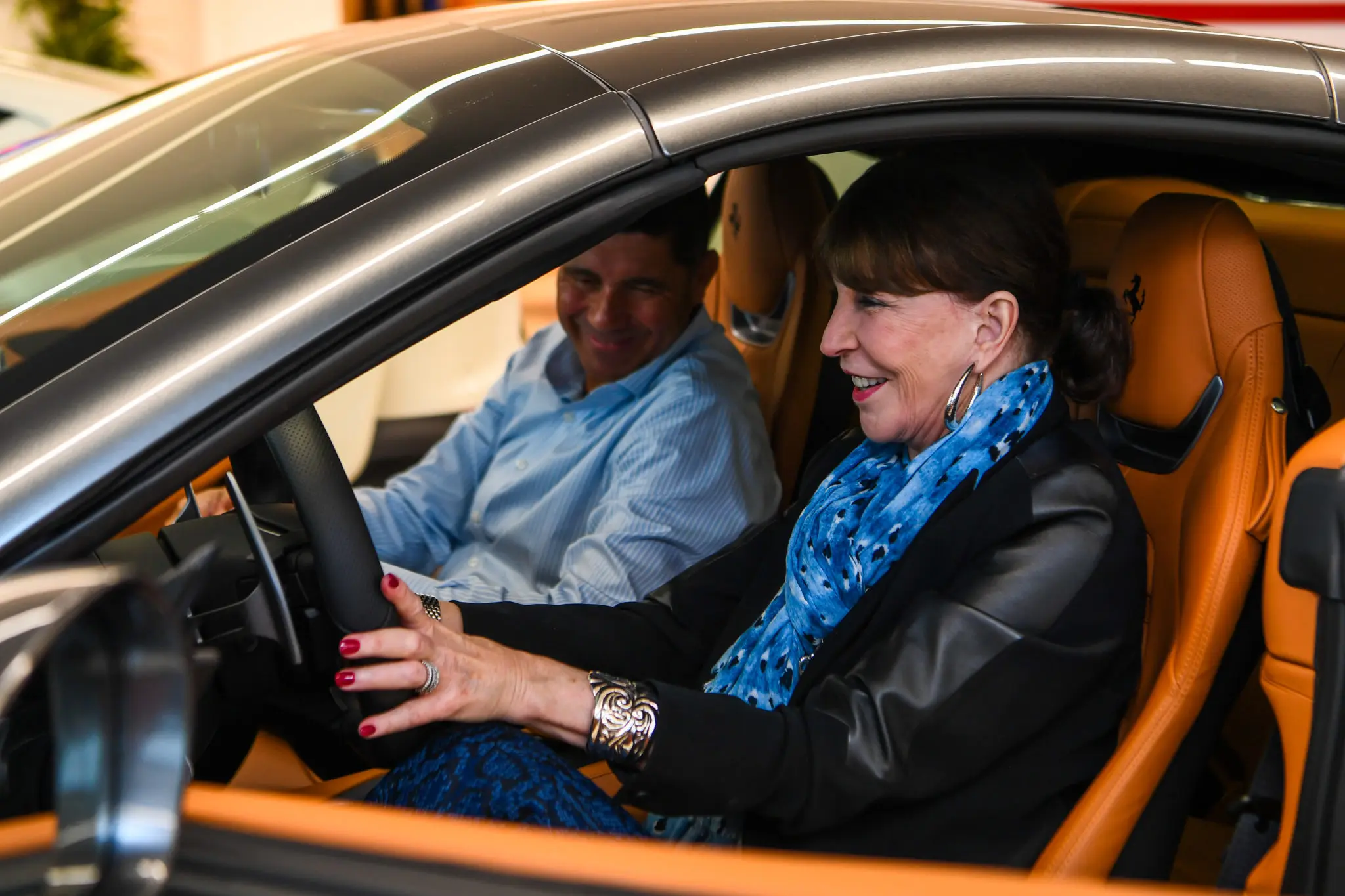 Ferrari of Houston Ferrari specialist Joe Maniaci explains the operation of the Portofino. (Photo by Michelle Watson)