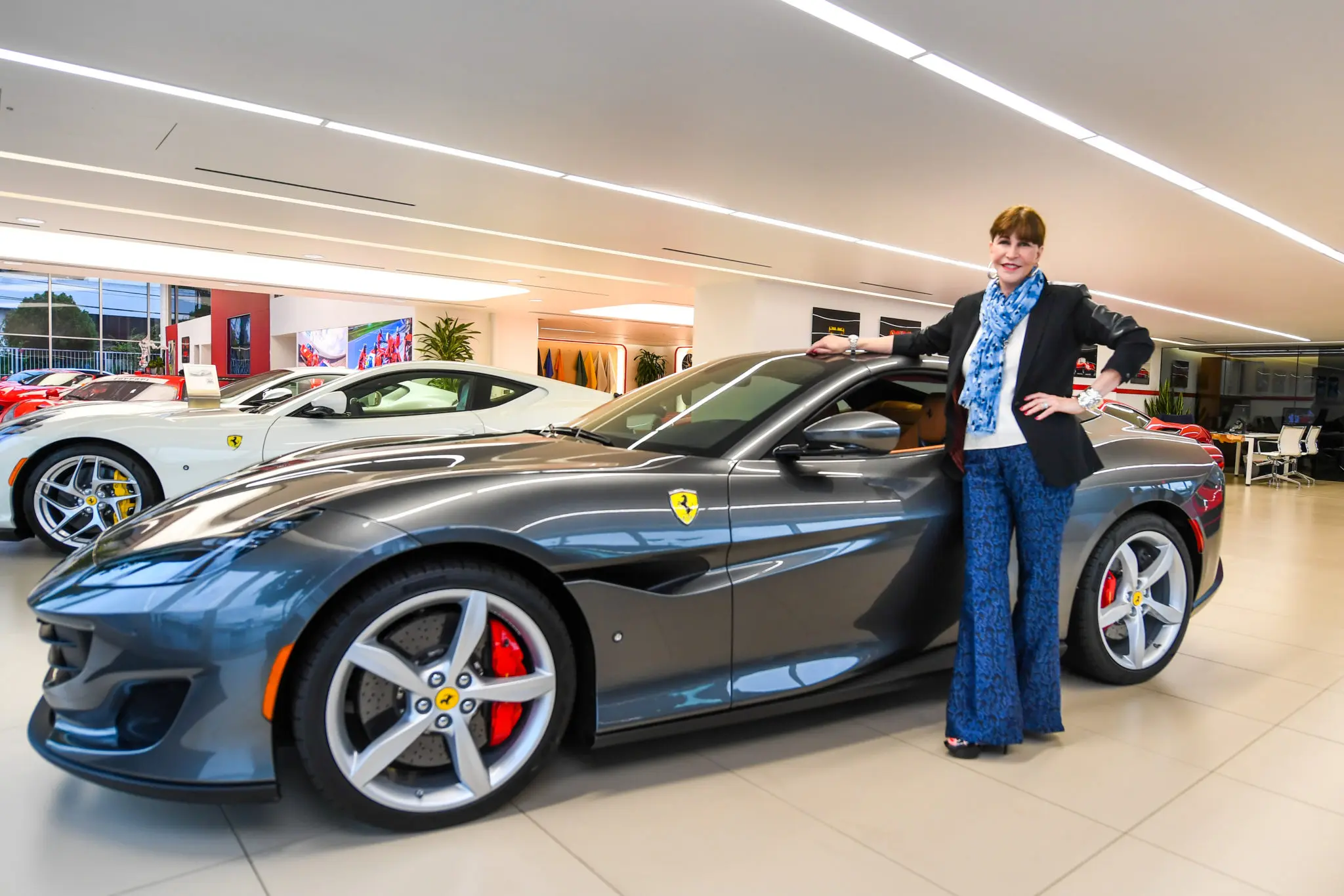 Yes, PaperCity Society and Lifestyle editor Shelby Hodge is in love with the Ferrari Portofino. (Photo by Michelle Watson)