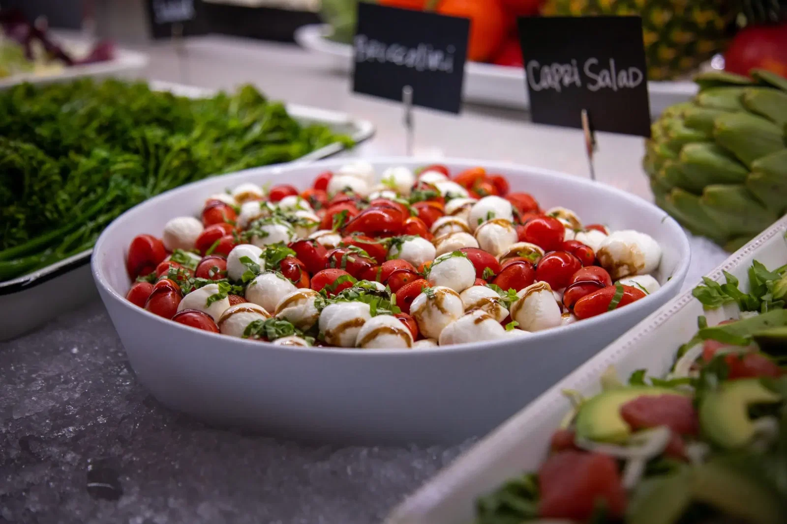 The salad bar has a capri salad. 