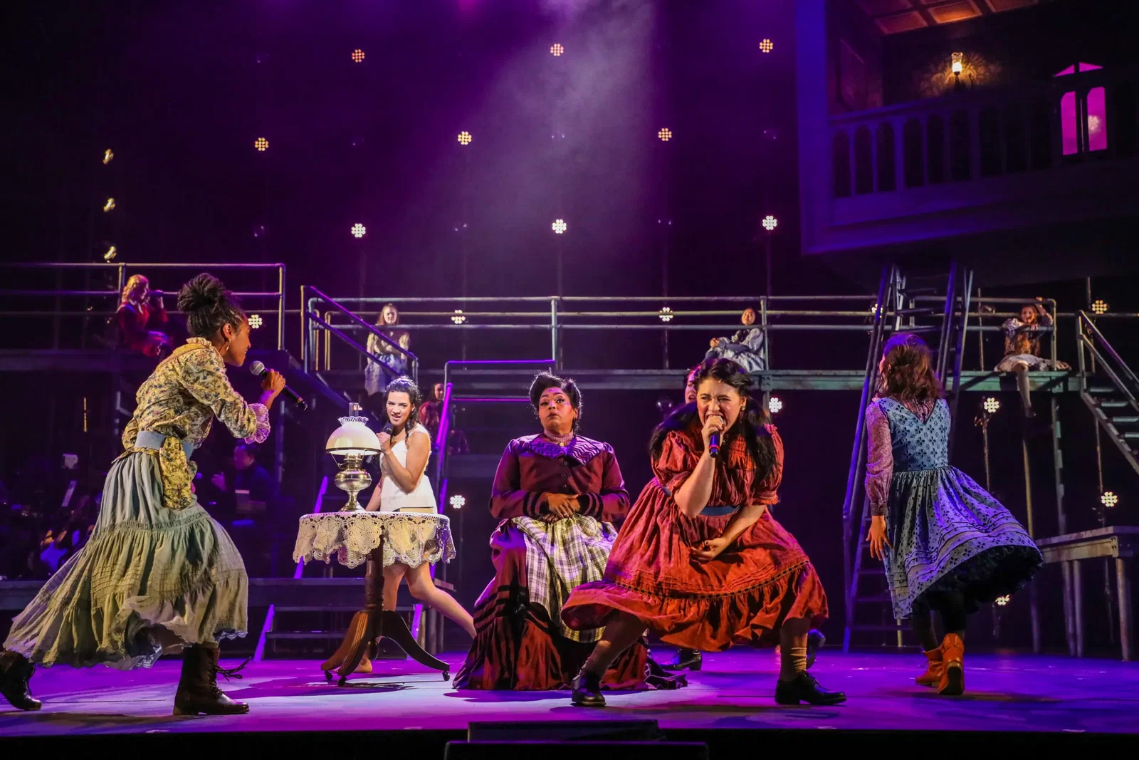 Raven Justine Troup as “Ilse,” Sophia Introna as “Wendla,” Liz Mikel as “The Adult Women,” Katja Rivera Yanko as “Thea,” and Ana Yi Puig as “Anna” in the Theatre Under The Stars production of Spring Awakening. (Photo by Melissa Taylor)
