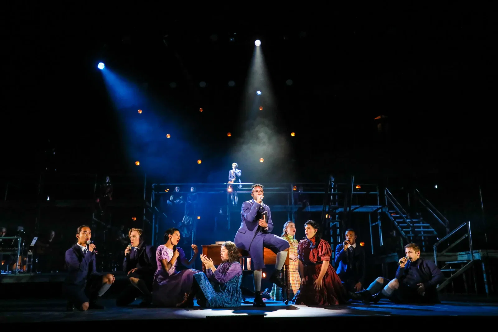 Wonza Johnson as “Melchior” and the Cast of Spring Awakening. (Photo by Melissa Taylor)