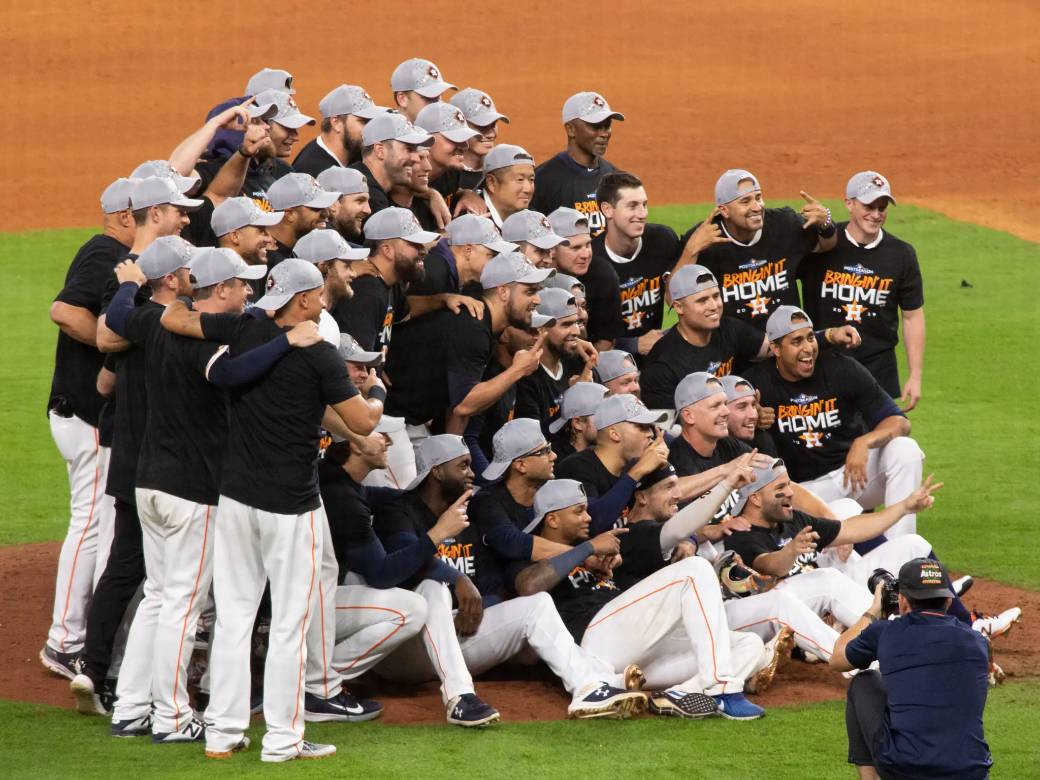 The Astros are a team in every sense of the word. Kyle Tucker didn't get the memo about wearing the hats in the photo. (Photo by F. Carter Smith)