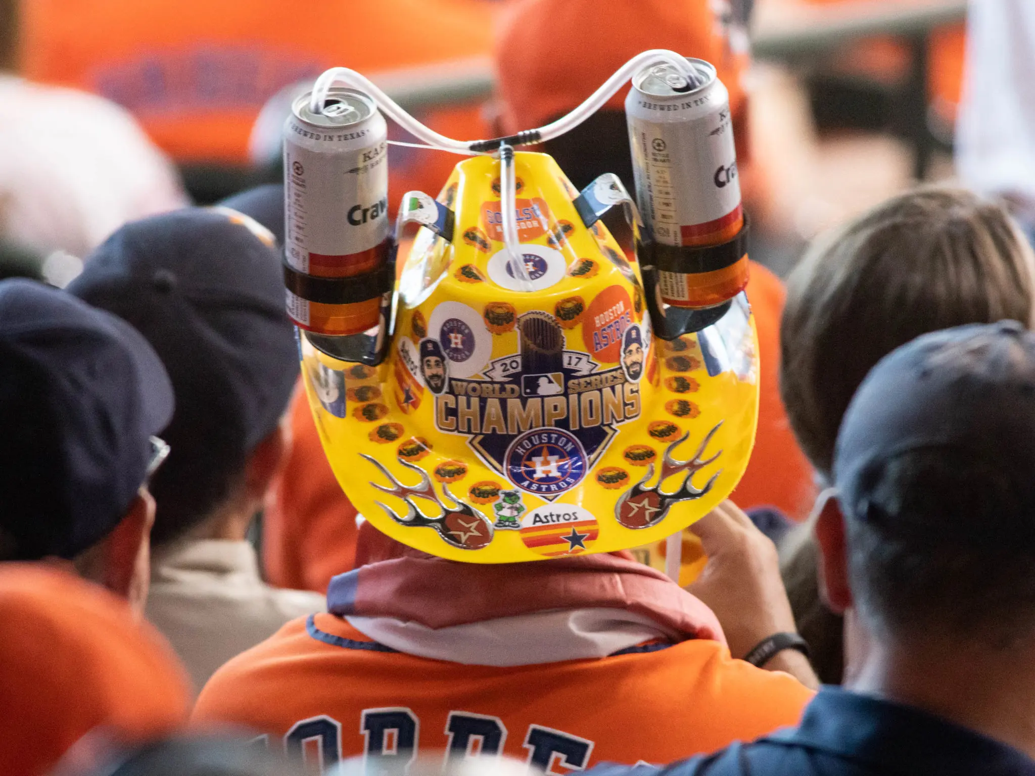 Astros fans are certainly creative with their attire — and drink options. (Photo by F. Carter Smith)