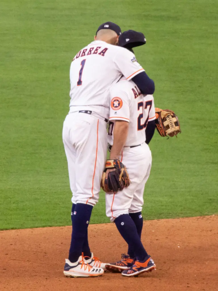 Carlos Correa knows that Jose Altuve deserves plenty of love for his playoff heroics. Now Correa is back with the Astros and Altuve. (Photo by F. Carter Smith)