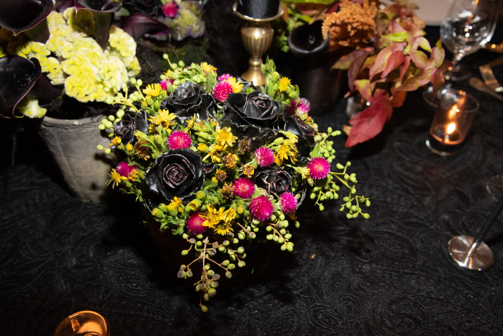 Dipped roses in black from Bergner & Johnson which created the creepy decor for "A Wicked Affair" (Photo by Alexander's Fine Portrait Design)