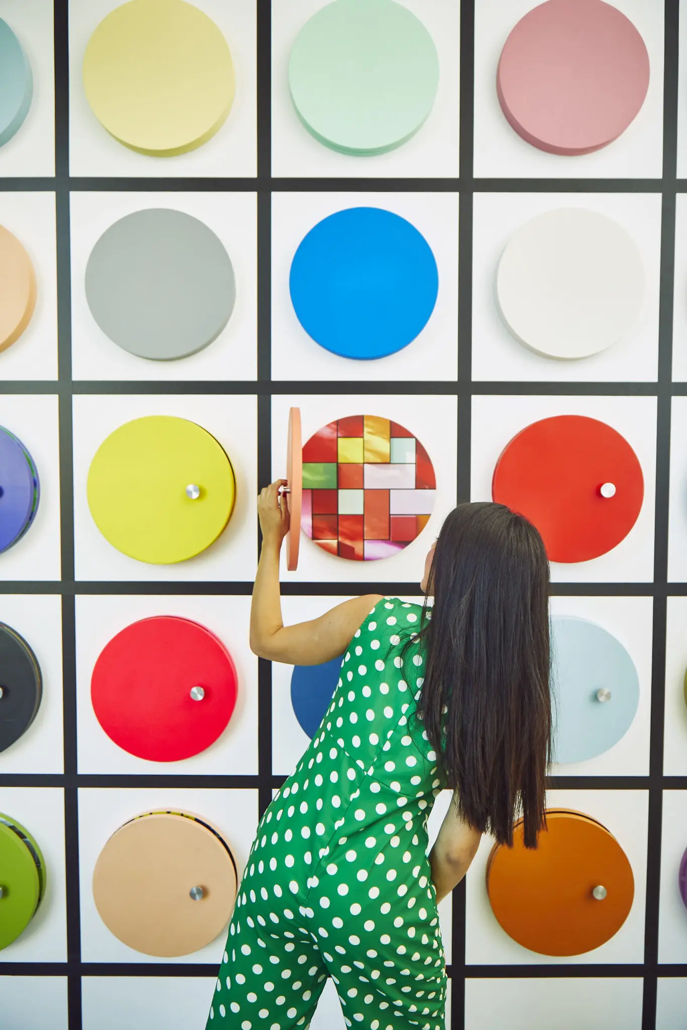 The "Houston In Color" wall features locations throughout the city that served as inspiration for the colors selected. (Photo by Cody Bess)