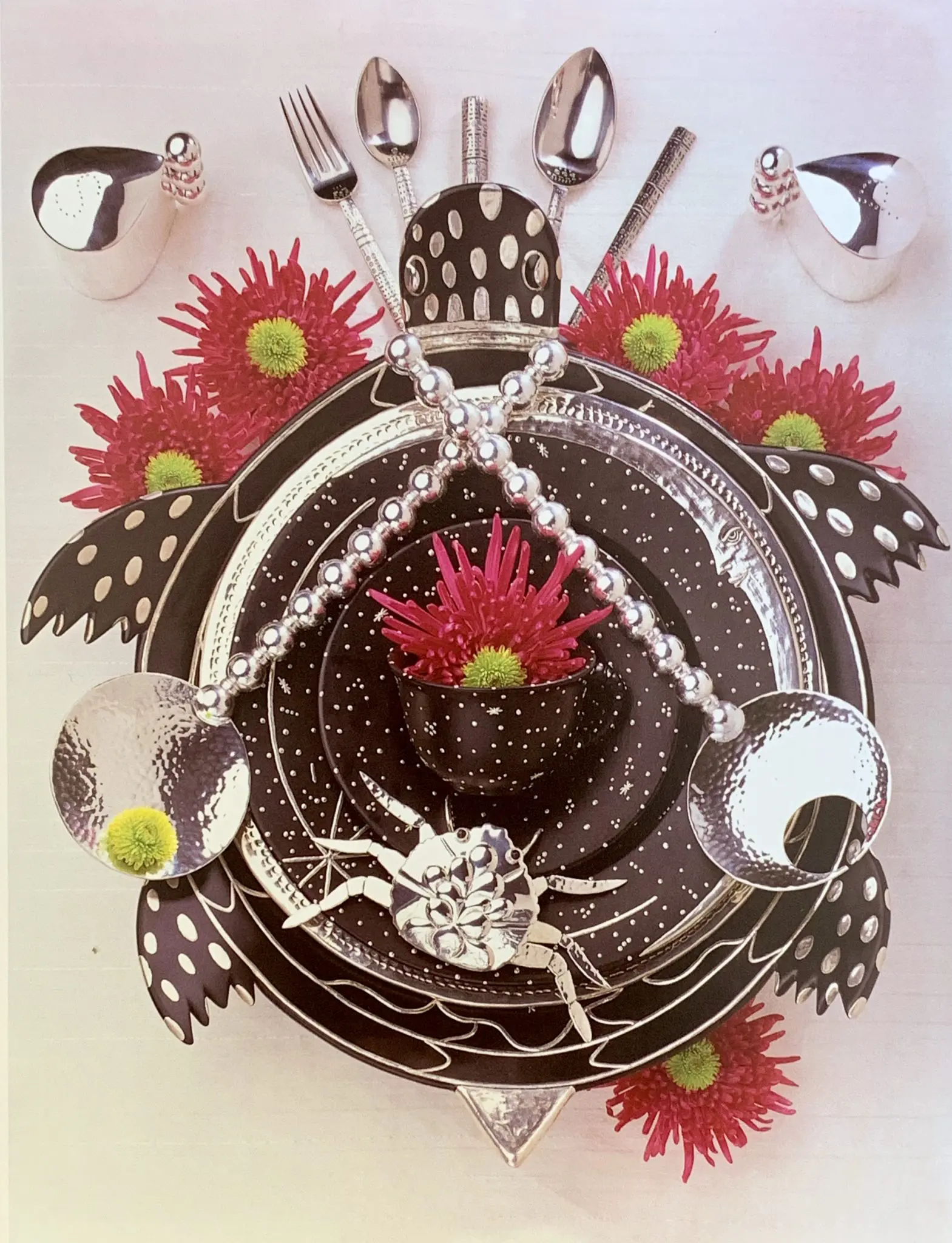Tabletop setting at Brenda Schoenfeld, with Emilia Castillo silver accessories.