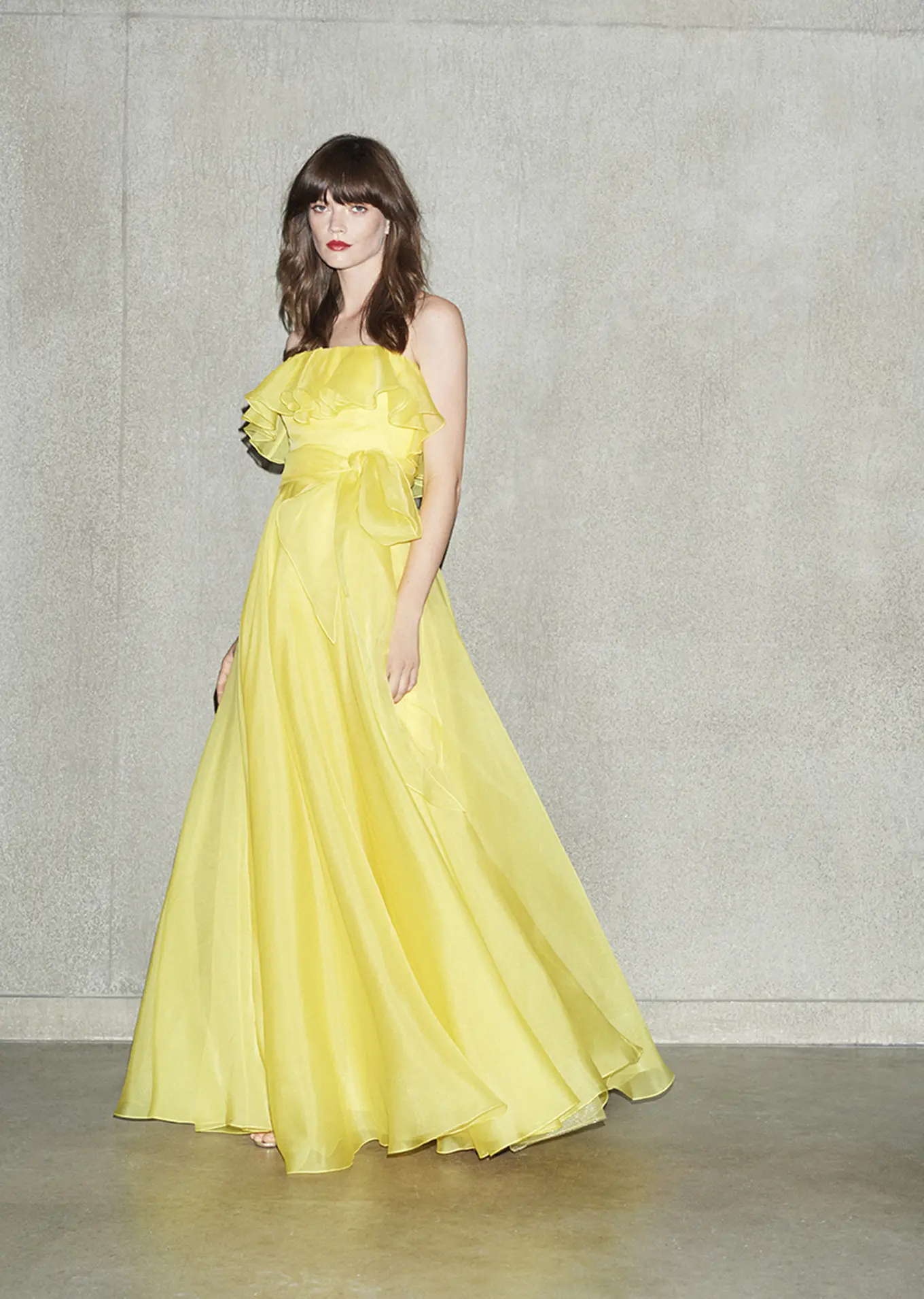 Jenny Packham buttercup yellow organza frill gown. (Photo courtesy of Jenny Packham)