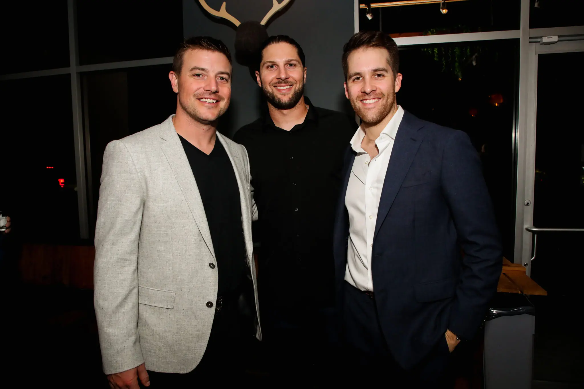 Joe Smith, Jake Marisnick, Collin McHugh (Photo by Alex Bierens de Haan )