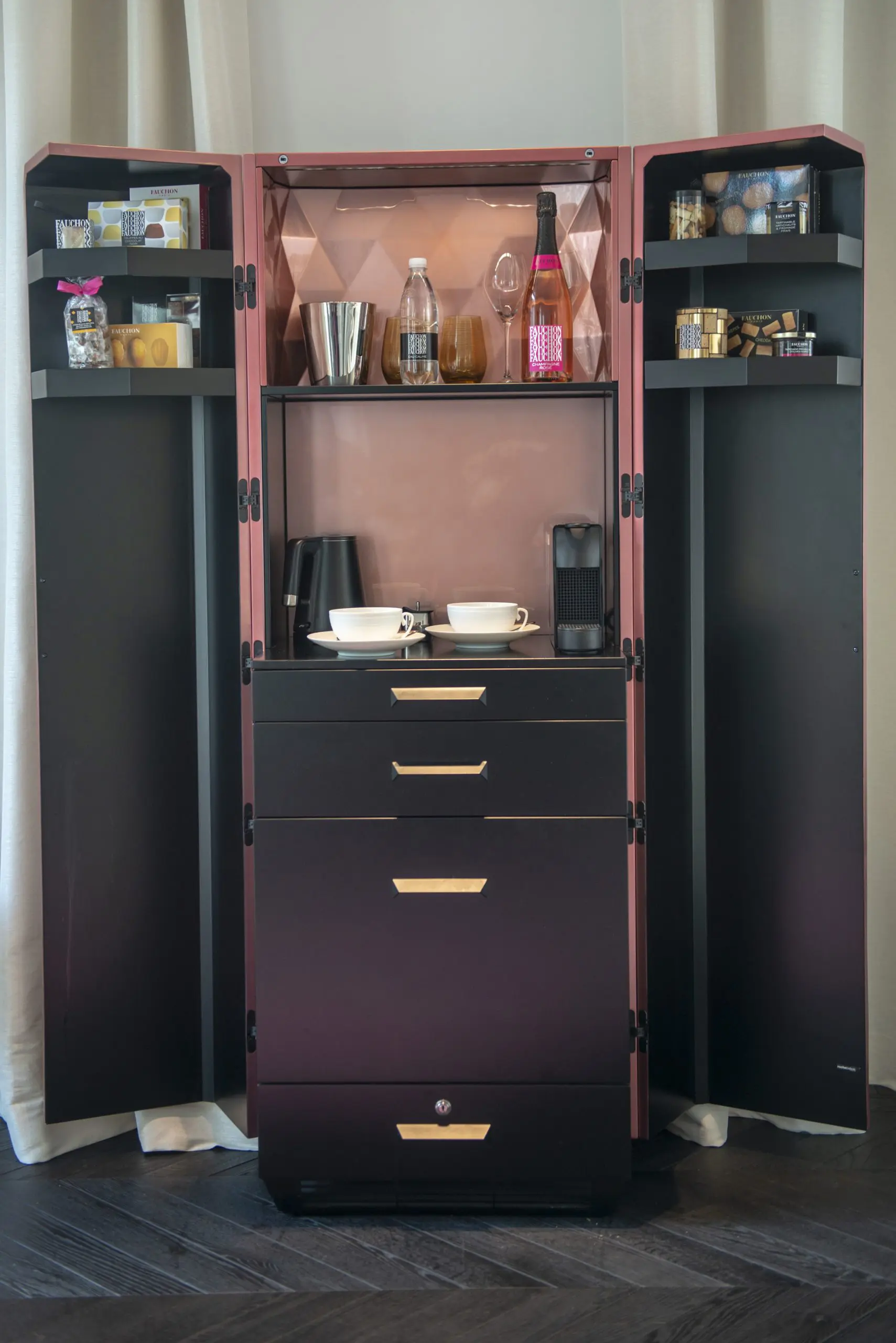 The Gourmet Bar sits pretty in every single suite. 