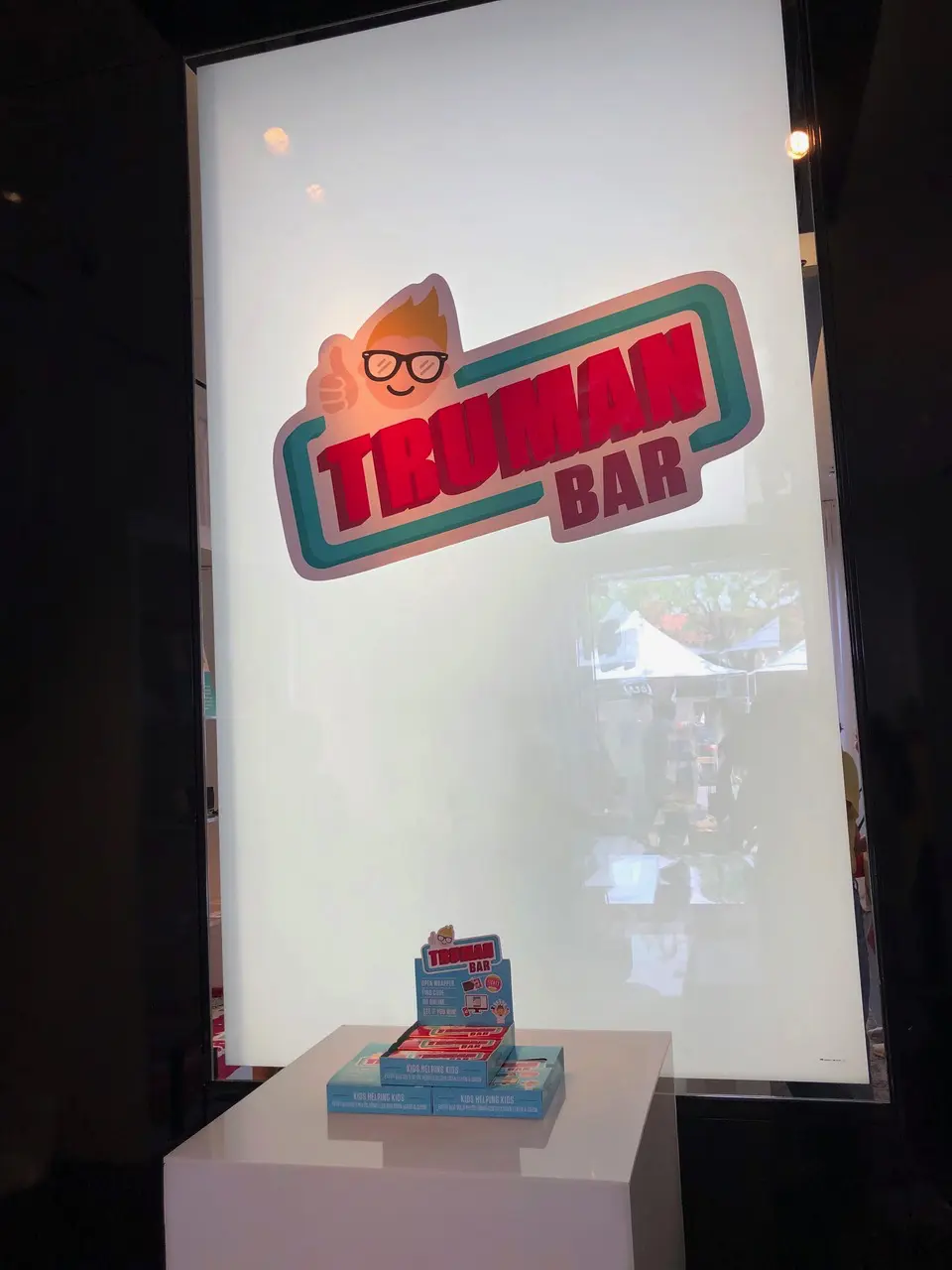 The companies well-known logo welcomes guests to the party.